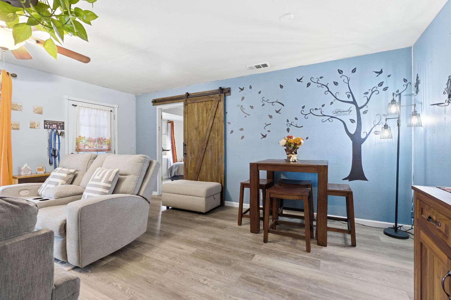 405 East Edison Street Manteca, CA 95336 - Photo 8 of 38 a living room with furniture and a wooden floor