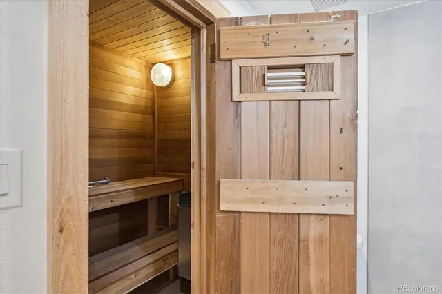 a view of backyard with a patio and plants