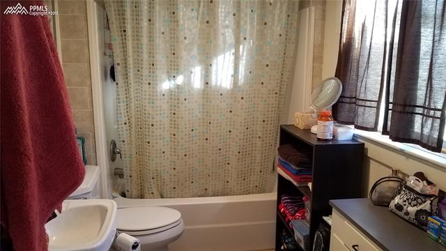 30836 Washington Road Calhan, CO 80808 - Photo 9 of 30 Full sized bathroom located on the main level. It has been updated.