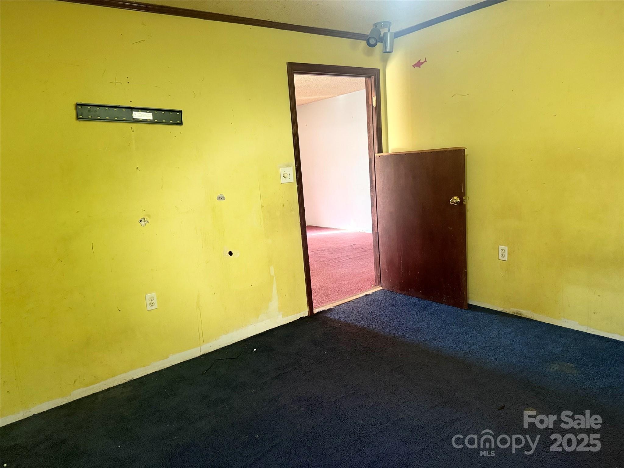 138 Rash Road Lincolnton, NC 28092 - Photo 11 of 41 a view of an empty room with a door