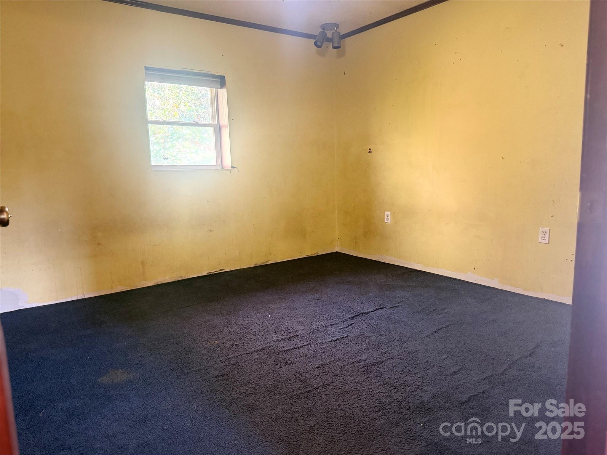 138 Rash Road Lincolnton, NC 28092 - Photo 12 of 41 an empty room with a empty space and a window