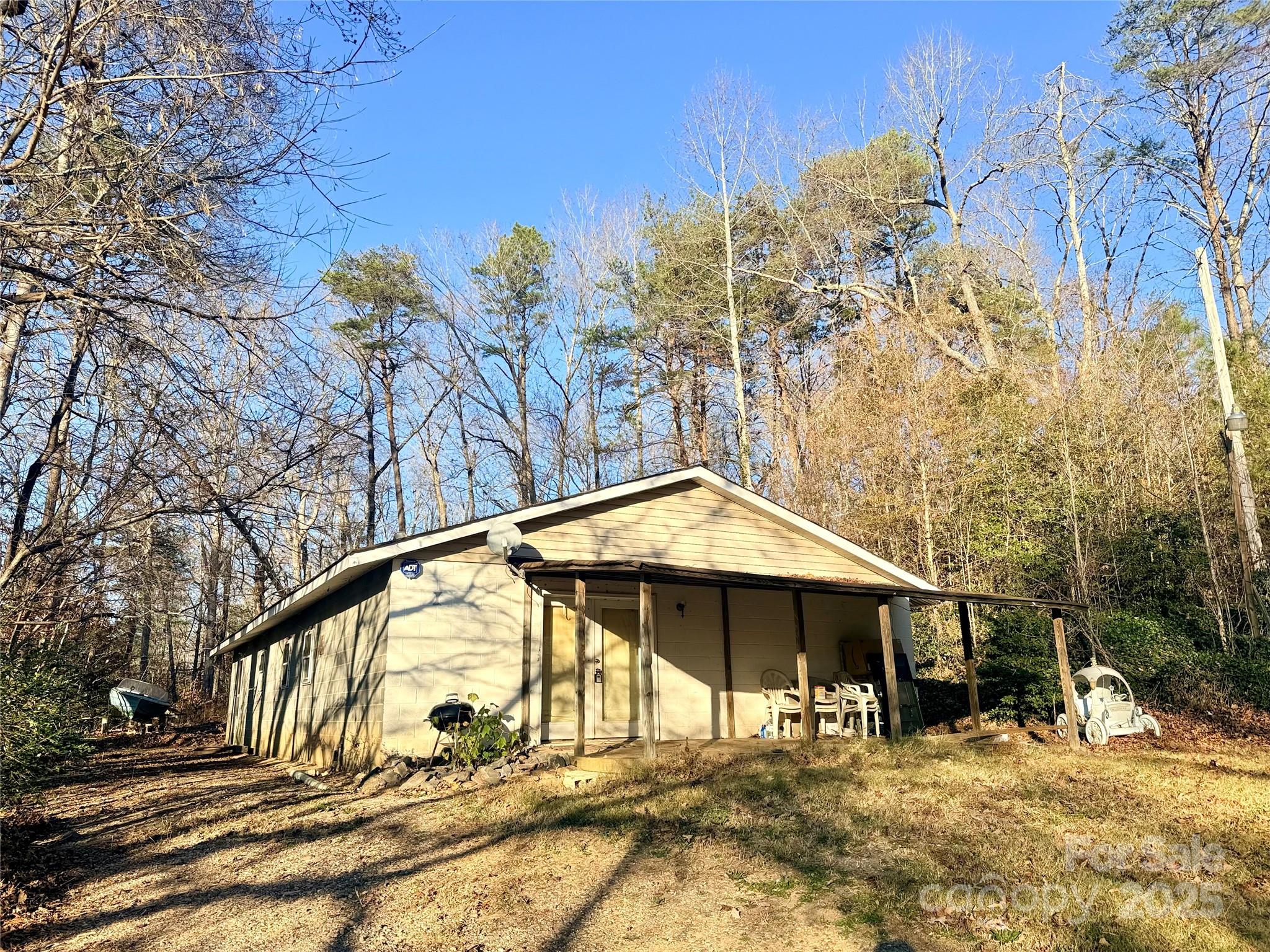 138 Rash Road Lincolnton, NC 28092 - Photo 2 of 41 a backyard of a house with table and chairs