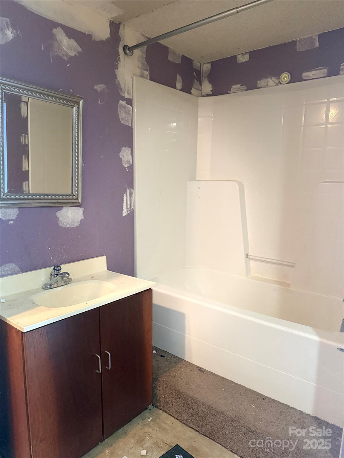 138 Rash Road Lincolnton, NC 28092 - Photo 7 of 41 a bathroom with a sink vanity tub and a mirror