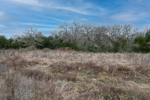 a view of roof deck with furniture