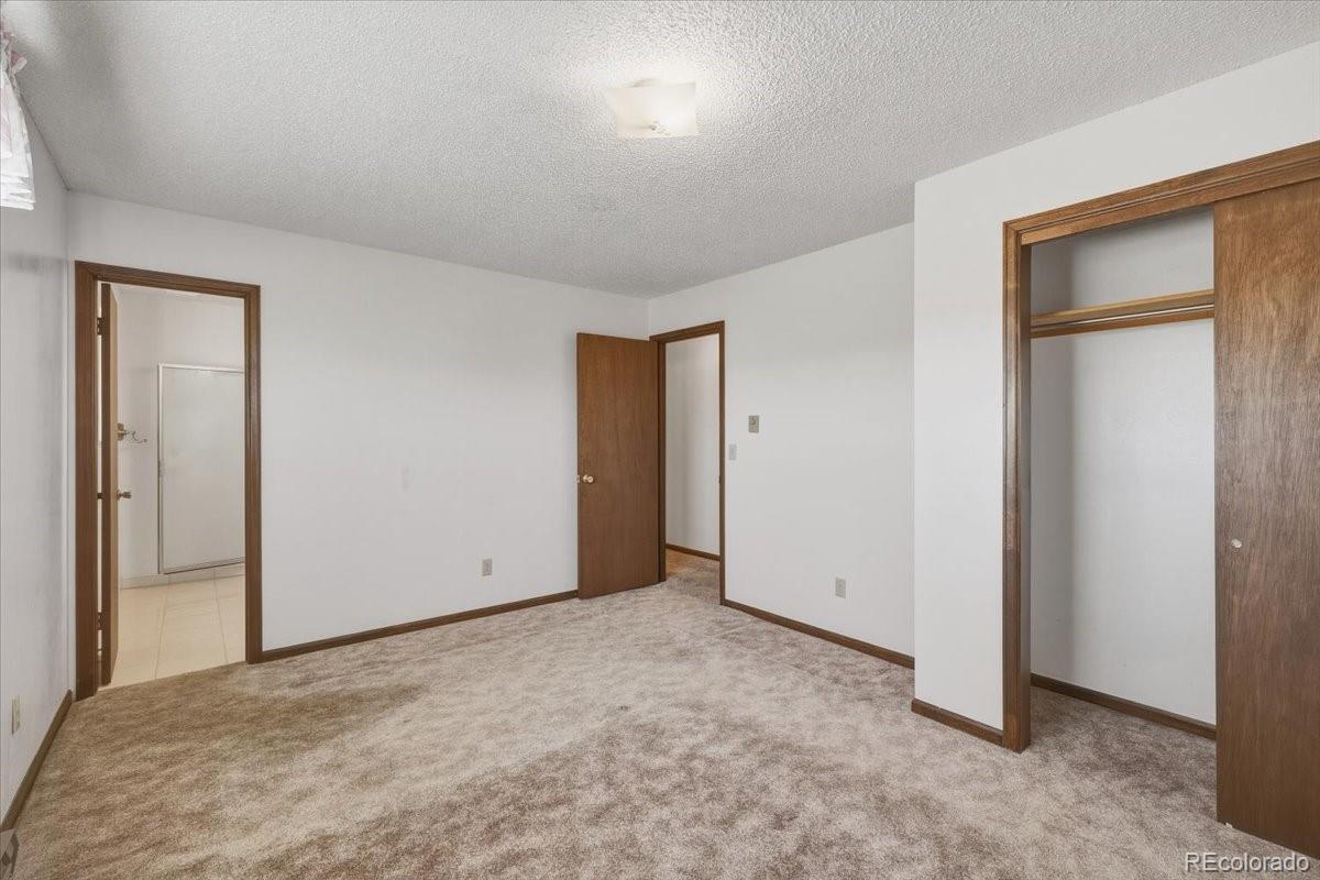 12720 South Mesa View Road Larkspur, CO 80118 - Photo 18 of 45 a view of an empty room