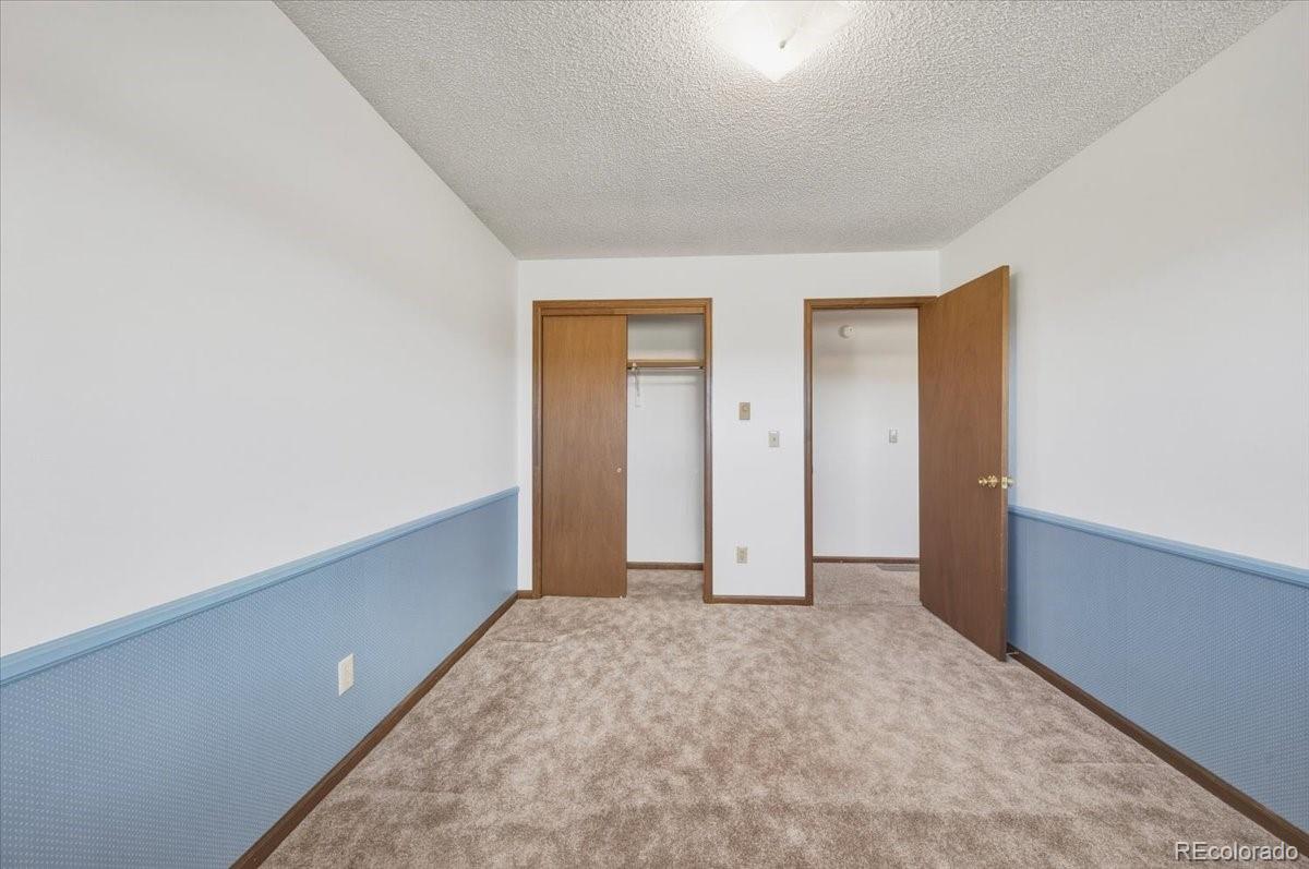 12720 South Mesa View Road Larkspur, CO 80118 - Photo 24 of 45 a view of room