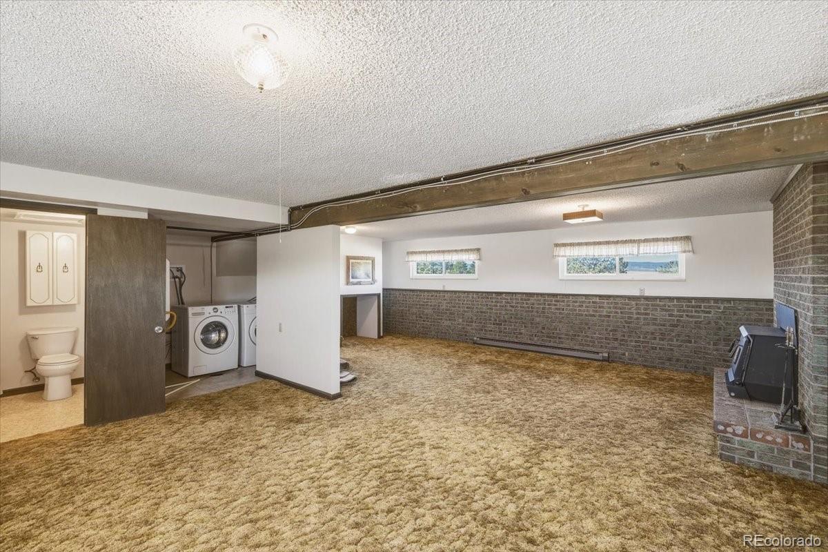 12720 South Mesa View Road Larkspur, CO 80118 - Photo 32 of 45 a view of a garage