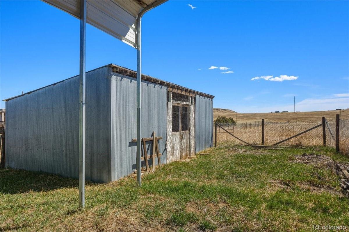 12720 South Mesa View Road Larkspur, CO 80118 - Photo 38 of 45 a view of a backyard