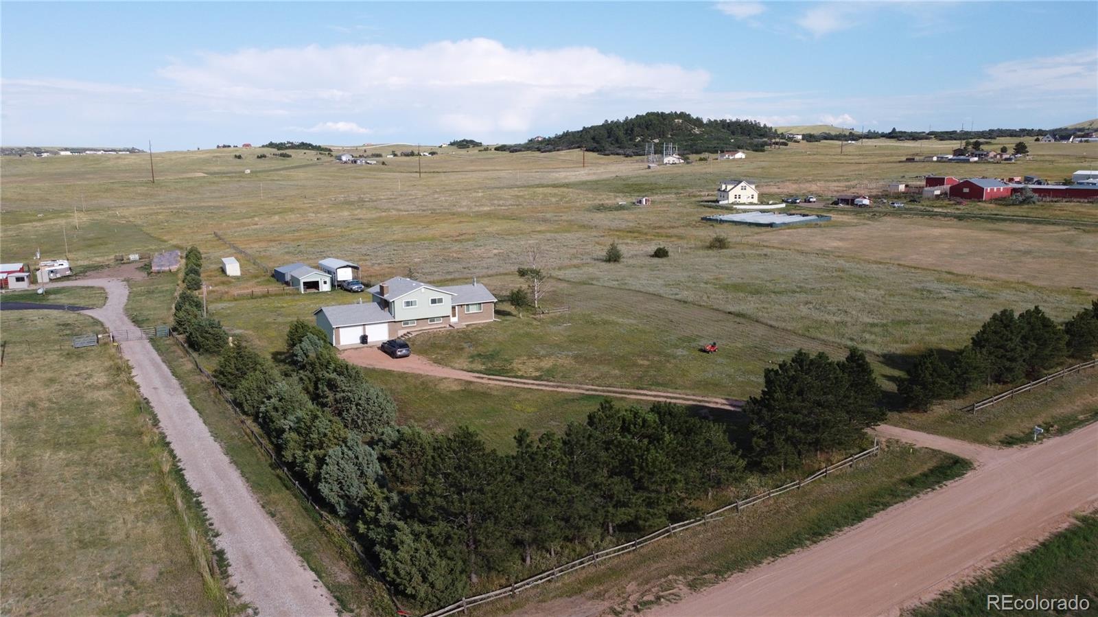 12720 South Mesa View Road Larkspur, CO 80118 - Photo 5 of 45 a view of a city and an ocean view