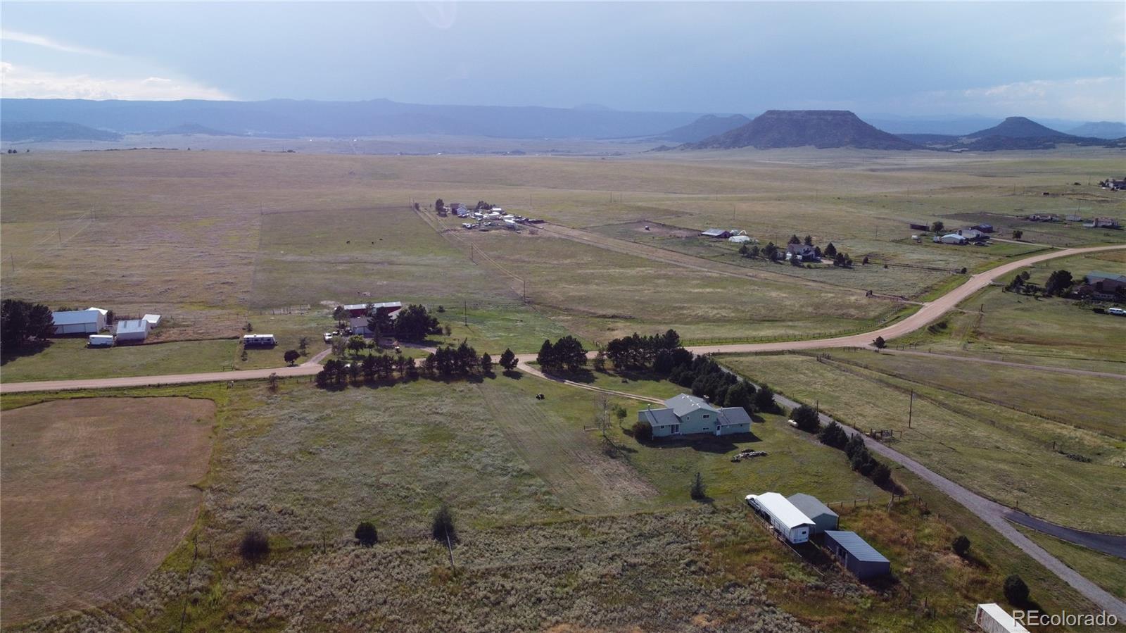 12720 South Mesa View Road Larkspur, CO 80118 - Photo 7 of 45 a view of a town with an ocean