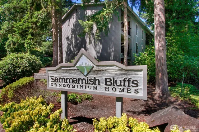 a view of a car parked in front of a house