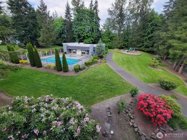 a view of a back yard with green space