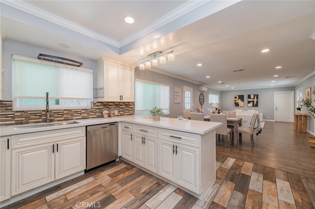 9163 Duarte Road San Gabriel, CA 91775 - Photo 14 of 38 a large kitchen with lots of counter and chairs