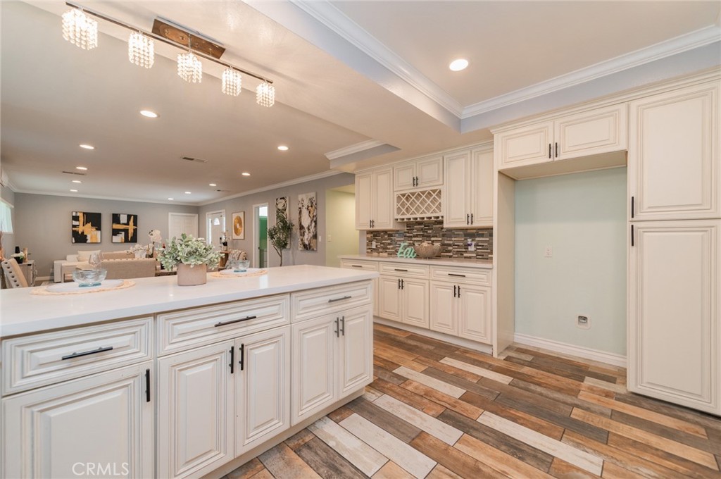 9163 Duarte Road San Gabriel, CA 91775 - Photo 15 of 38 a kitchen with white cabinets and white appliances