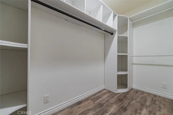 a view of an empty walk in closet