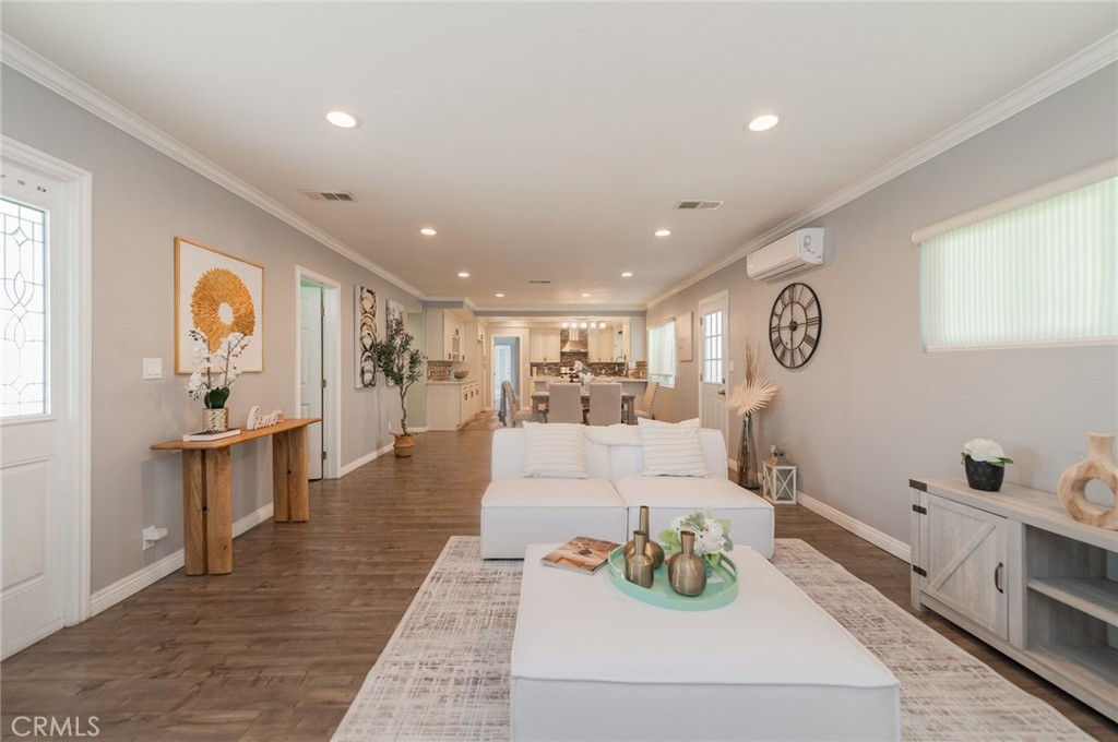 9163 Duarte Road San Gabriel, CA 91775 - Photo 7 of 38 a living room with furniture and a wooden floor