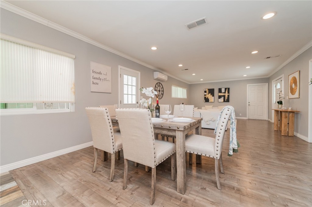 9163 Duarte Road San Gabriel, CA 91775 - Photo 9 of 38 a dining room with furniture and wooden floor