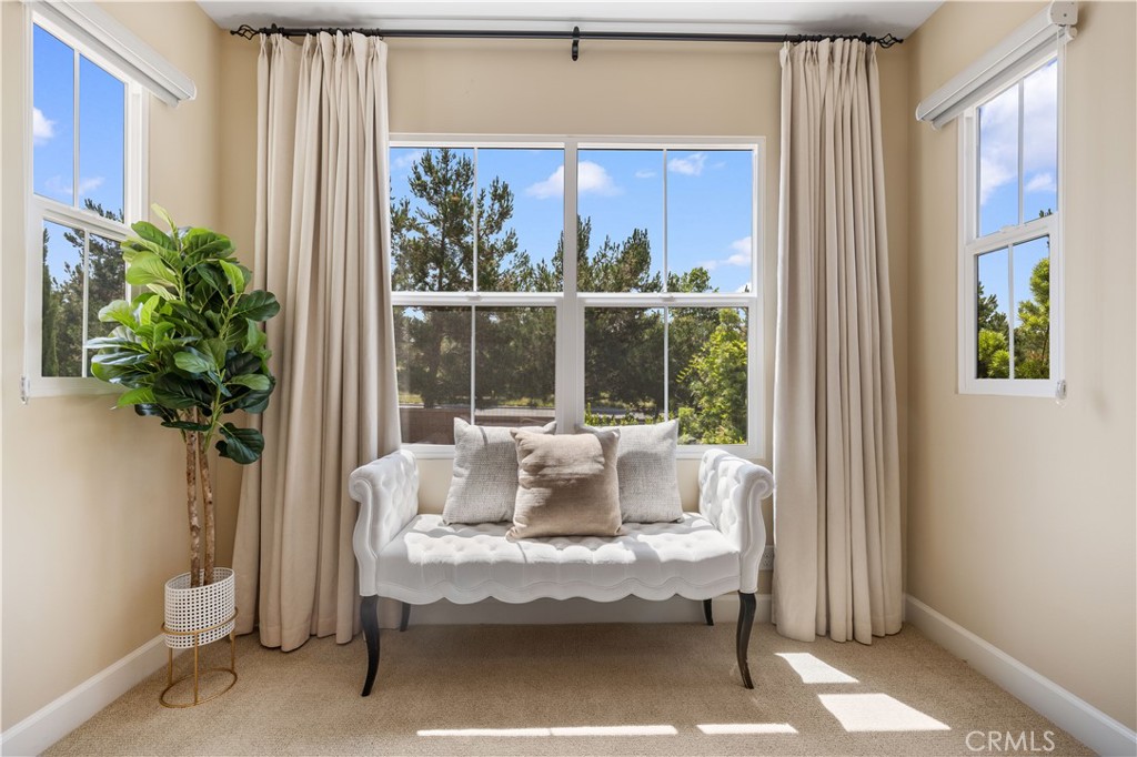 114 Omar Irvine, CA 92620 - Photo 12 of 25 a living room with furniture and a potted plant