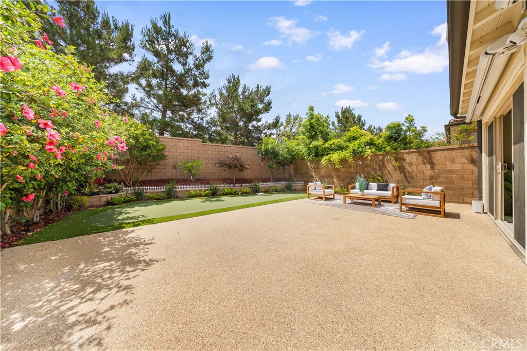 114 Omar Irvine, CA 92620 - Photo 19 of 25 a view of a street with a building and a street view