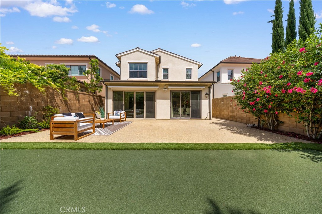 114 Omar Irvine, CA 92620 - Photo 20 of 25 a view of a house with a swimming pool