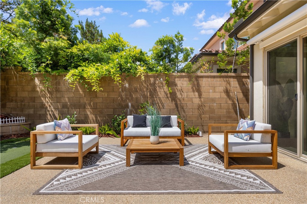 114 Omar Irvine, CA 92620 - Photo 22 of 25 a outdoor living space with furniture and a potted plant