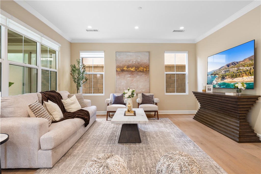 114 Omar Irvine, CA 92620 - Photo 4 of 25 a living room with furniture and large windows