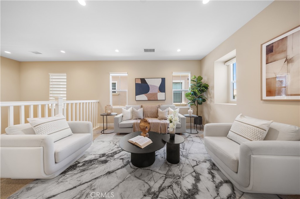 114 Omar Irvine, CA 92620 - Photo 9 of 25 a living room with furniture and a large window