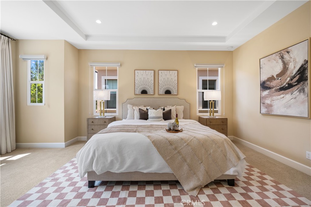 114 Omar Irvine, CA 92620 - Photo 10 of 25 a bedroom with a bed and wooden floor