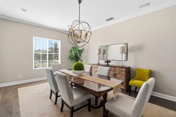a view of a dining room with furniture window and outside view