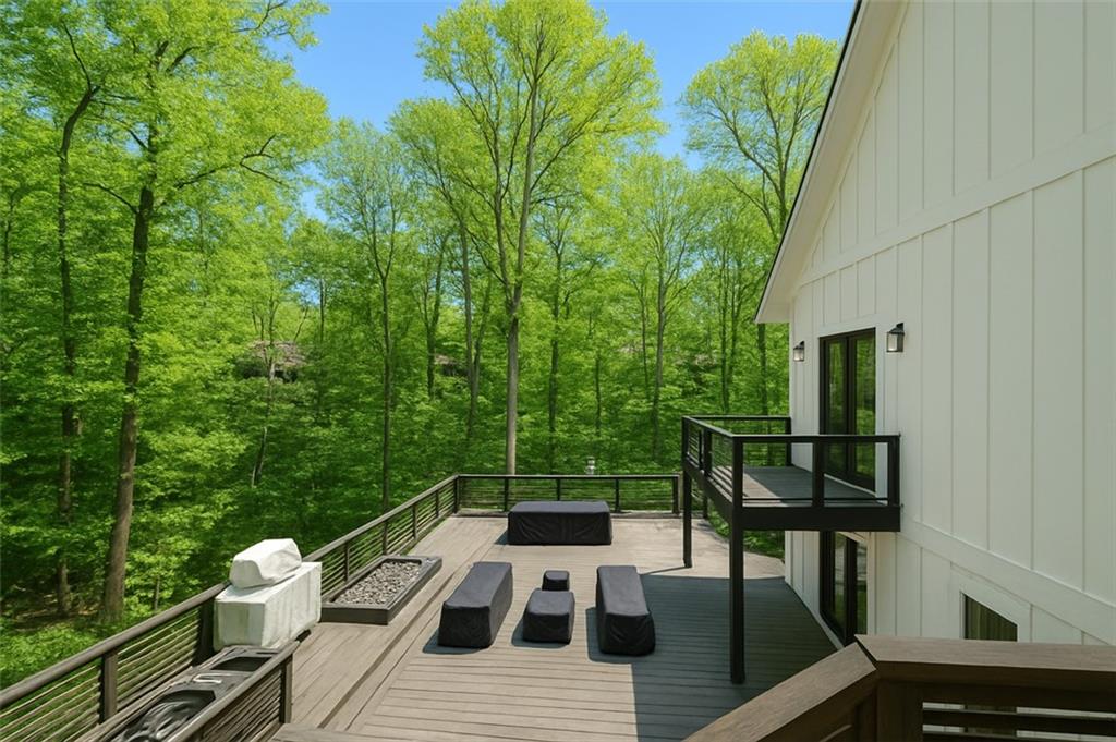 3880 The Ascent Northeast Atlanta, GA 30319 - Photo 4 of 5 a view of a chairs and table on the balcony