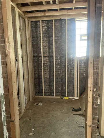 a view of a room with a large window