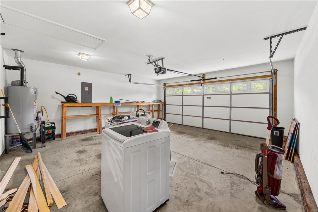 113 Crofton Court Easley, SC 29642 - Photo 20 of 33 This spacious garage offers ample storage and utility space, ideal for any homeowner's needs.