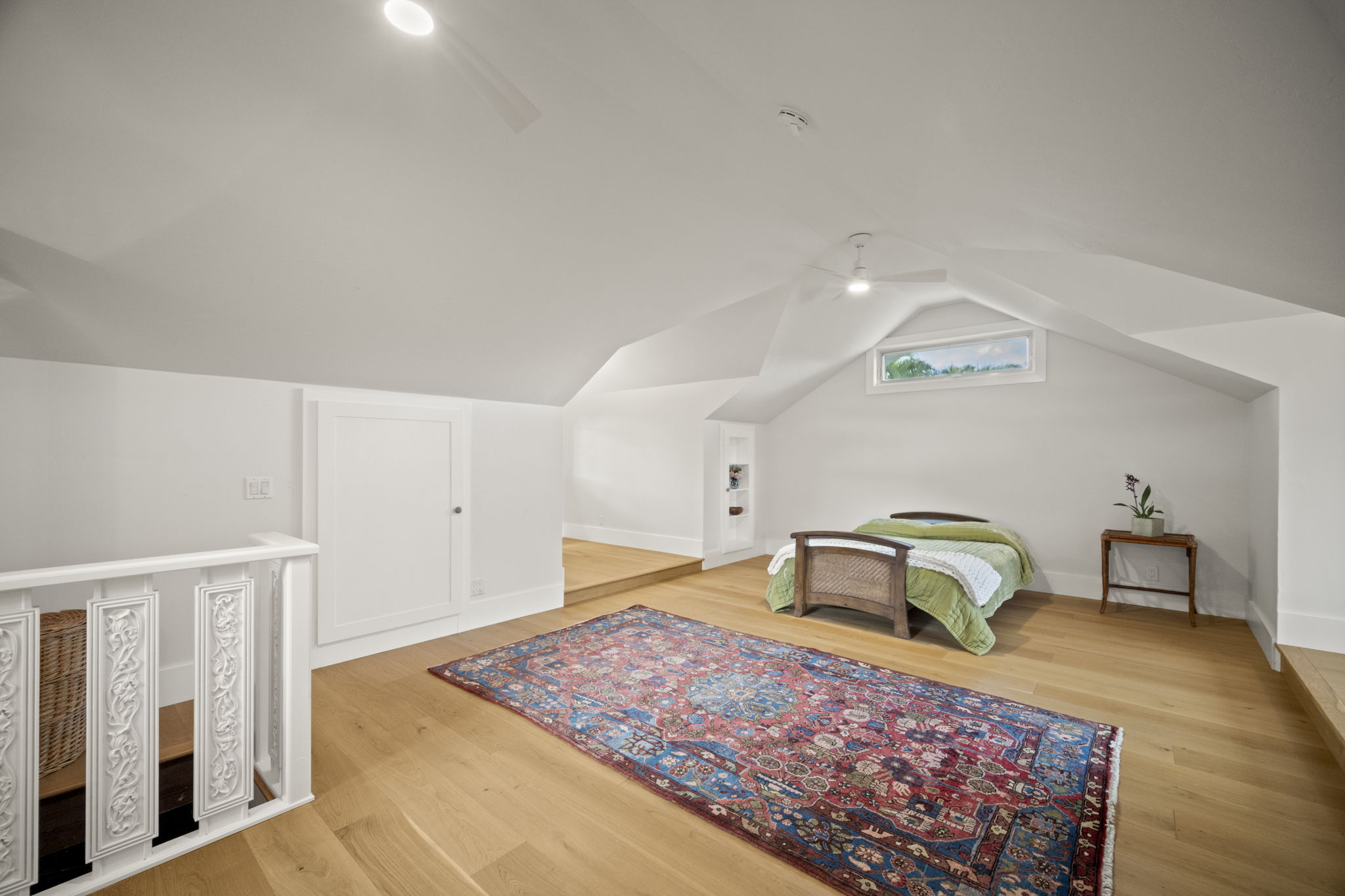 4691 Wailapa Road Kilauea, HI 96754 - Photo 16 of 30 a bedroom with a bed and a night stand