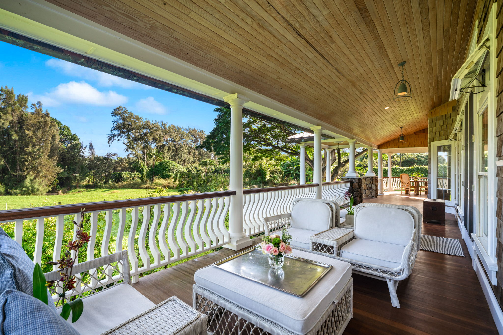 4691 Wailapa Road Kilauea, HI 96754 - Photo 20 of 30 a view of a patio with furniture and wooden floor