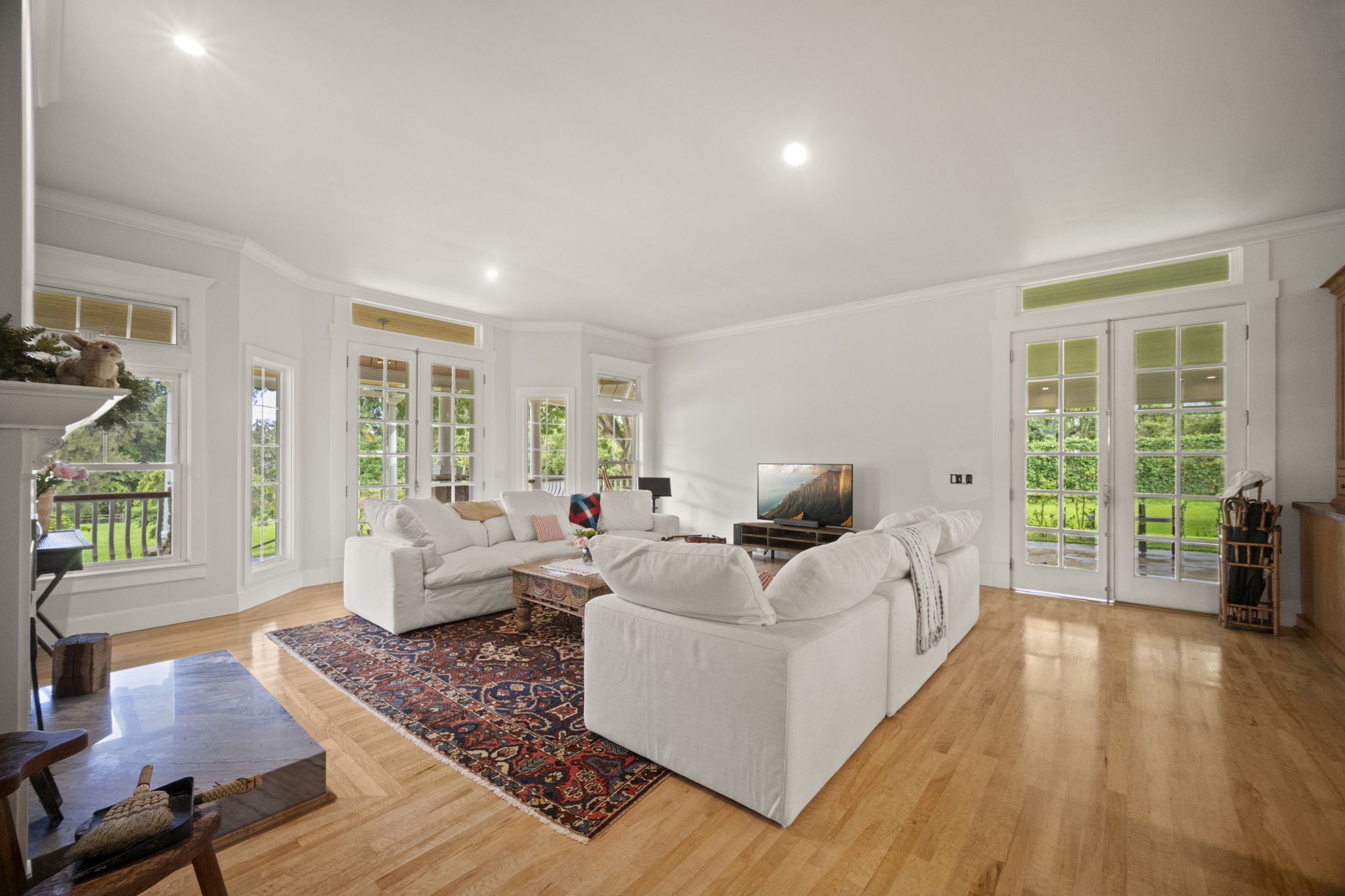 4691 Wailapa Road Kilauea, HI 96754 - Photo 3 of 30 a living room with furniture and a large window