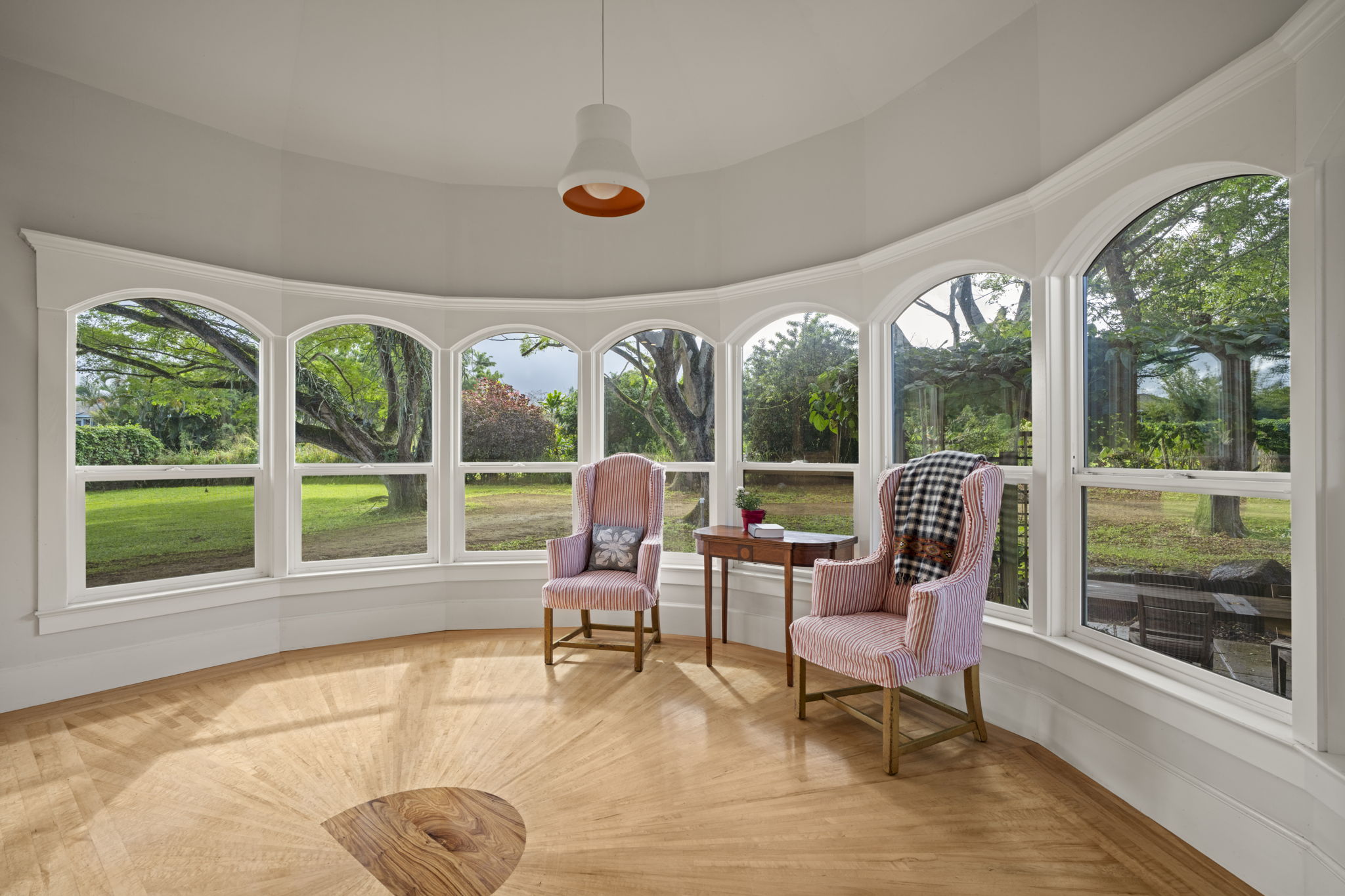 4691 Wailapa Road Kilauea, HI 96754 - Photo 6 of 30 a living room with hardwood floor and large windows