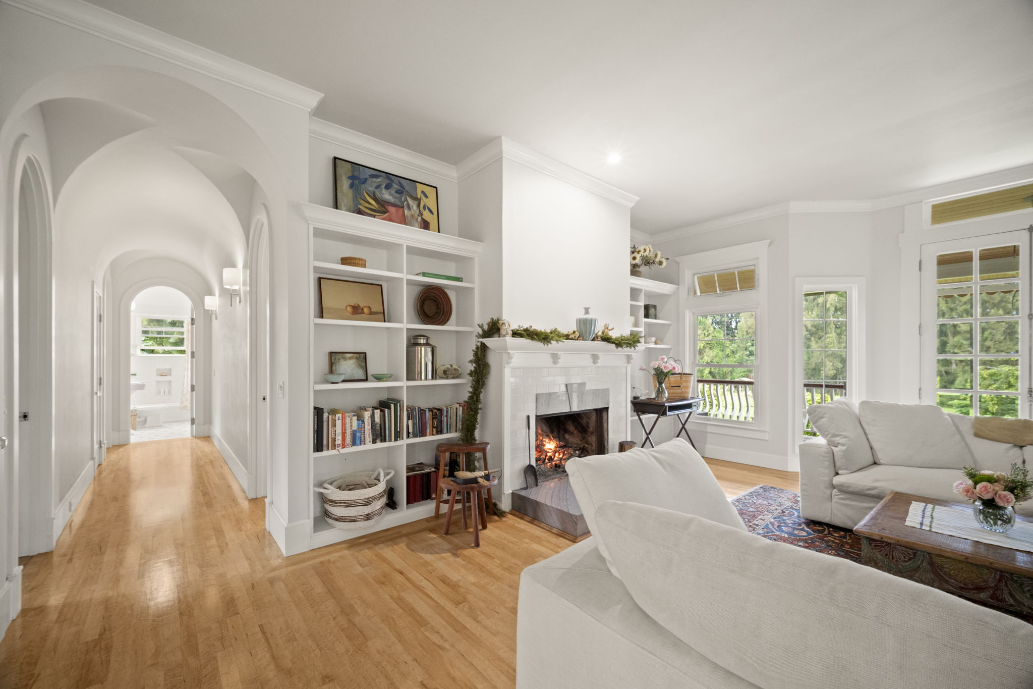 4691 Wailapa Road Kilauea, HI 96754 - Photo 9 of 30 a living room with furniture and fireplace