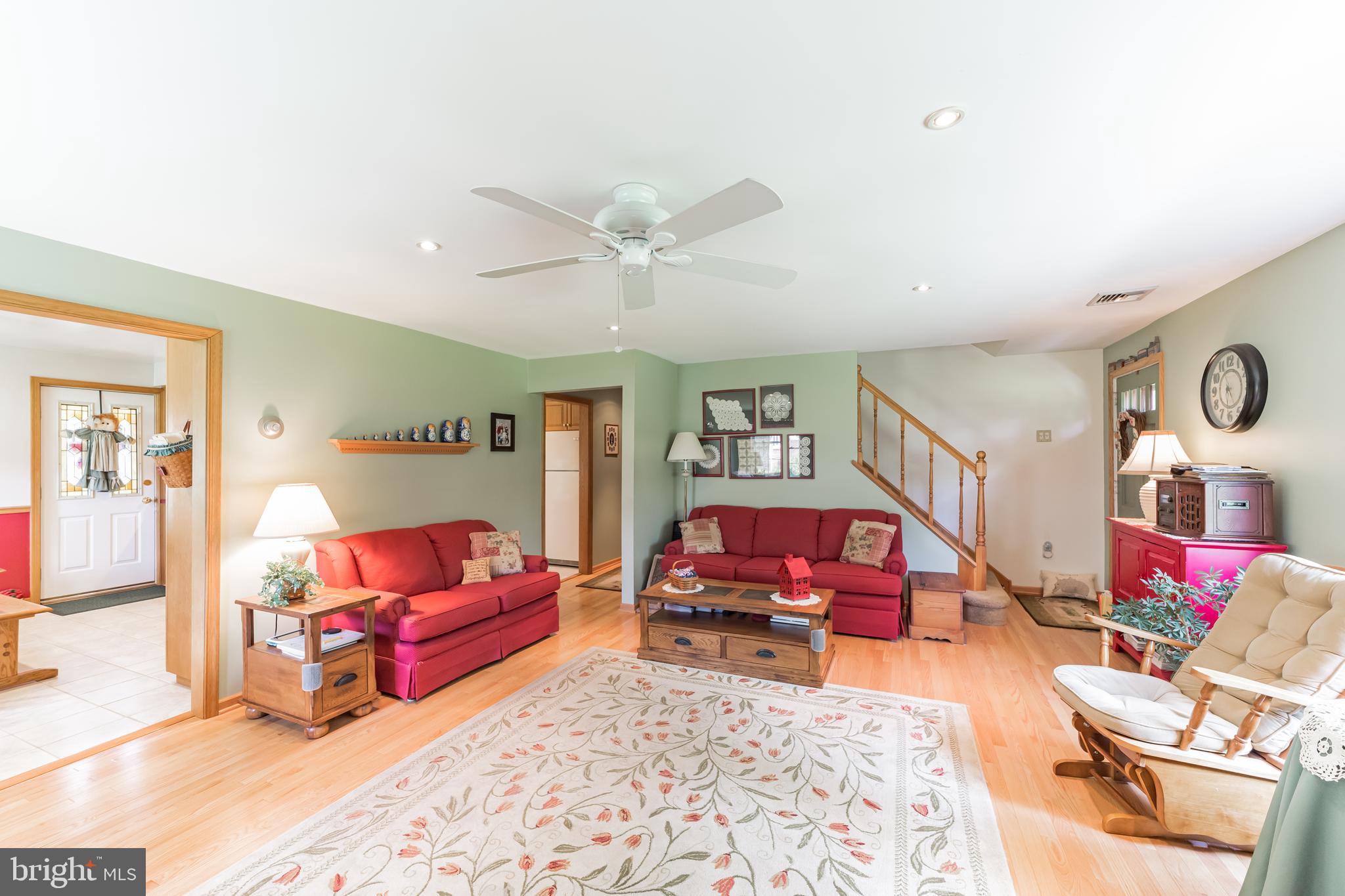 1335 Melvin Road Phoenixville, PA 19460 - Photo 12 of 38 Living Room /Stairway and Hallway