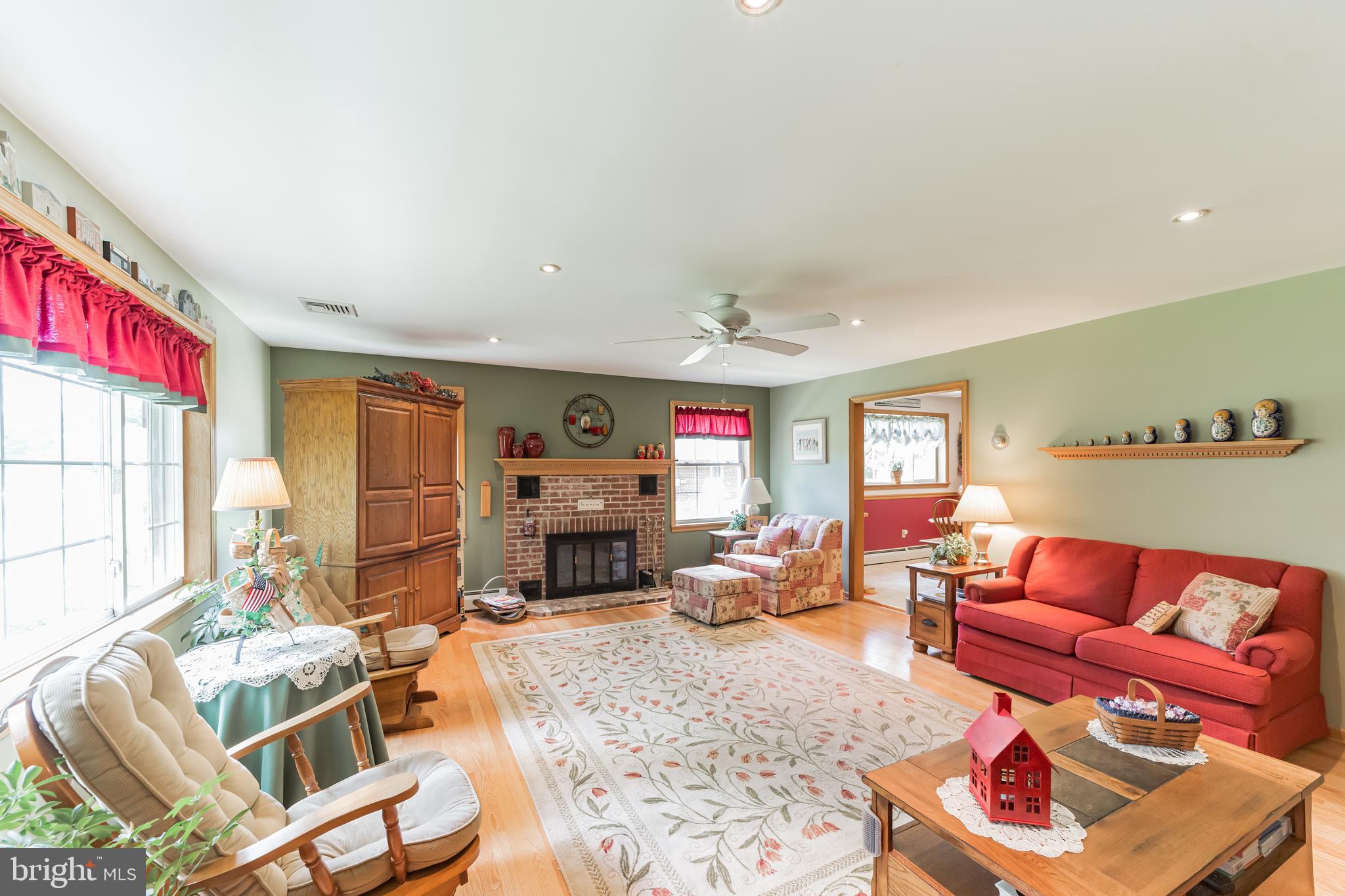 1335 Melvin Road Phoenixville, PA 19460 - Photo 13 of 38 Living Room w/ Brick, Wood Burning Fireplace