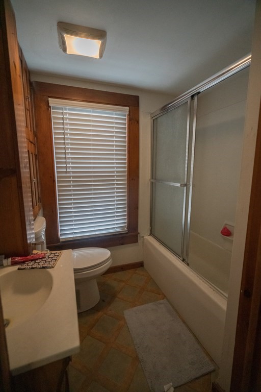 289 Pelham Road Amherst, MA 01002 - Photo 8 of 13 a bathroom with a sink and a mirror