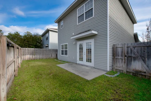 a view of a backyard with a garden