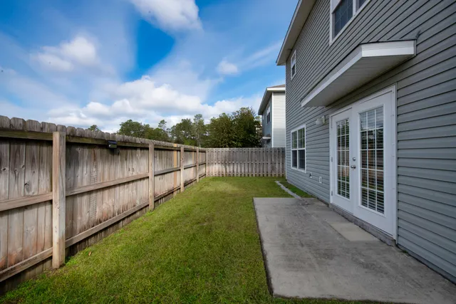 a view of a backyard with a small cabin