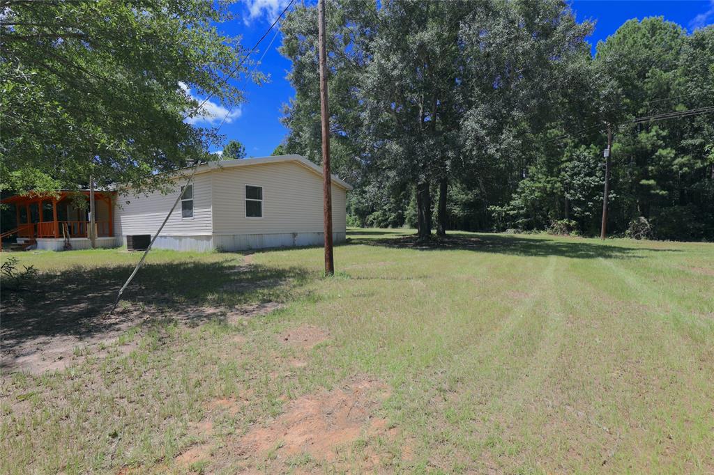 191 Circle Drive Mansfield, LA 71052 - Photo 6 of 22 a view of a backyard