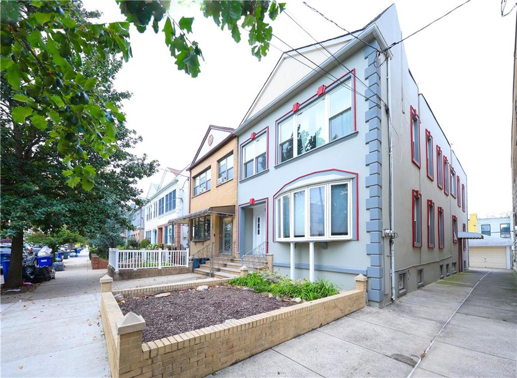 1049 Bay Ridge Parkway Brooklyn, NY 11228 - Photo 1 of 41 a front view of a building with street