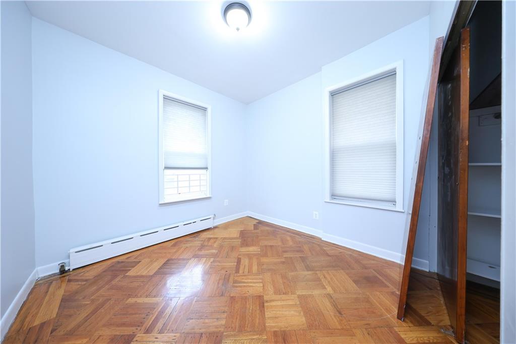 1049 Bay Ridge Parkway Brooklyn, NY 11228 - Photo 31 of 41 an empty room with windows