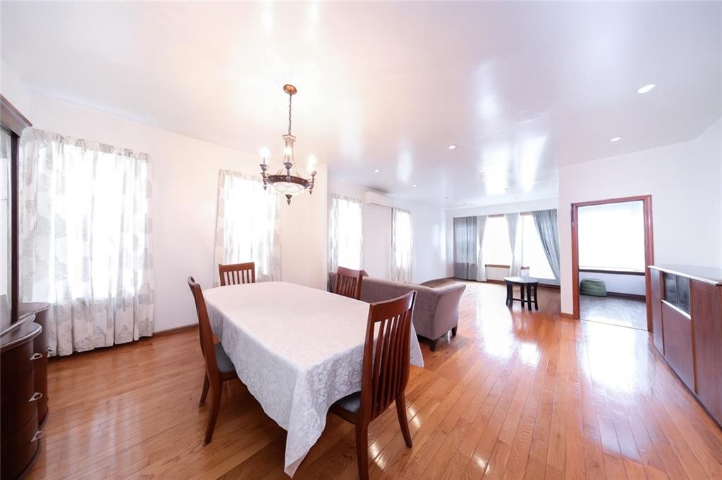 1049 Bay Ridge Parkway Brooklyn, NY 11228 - Photo 10 of 41 a view of a dining room with furniture and wooden floor