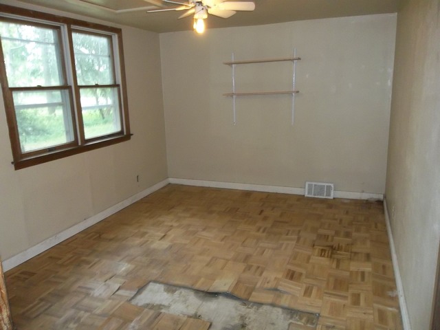1252 South Ridge Road Oregon, IL 61061 - Photo 8 of 14 an empty room with a window