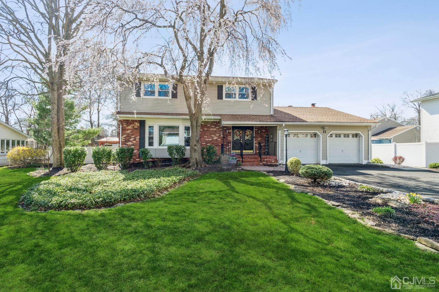 front view of a house with a yard