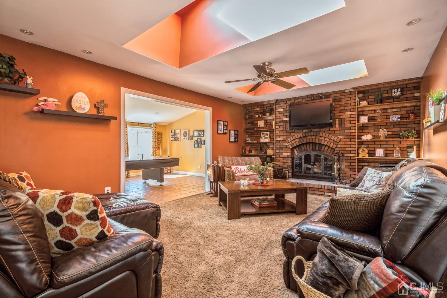 11 Boxwood Road Piscataway, NJ 08854 - Photo 11 of 28 a living room with furniture and a flat screen tv