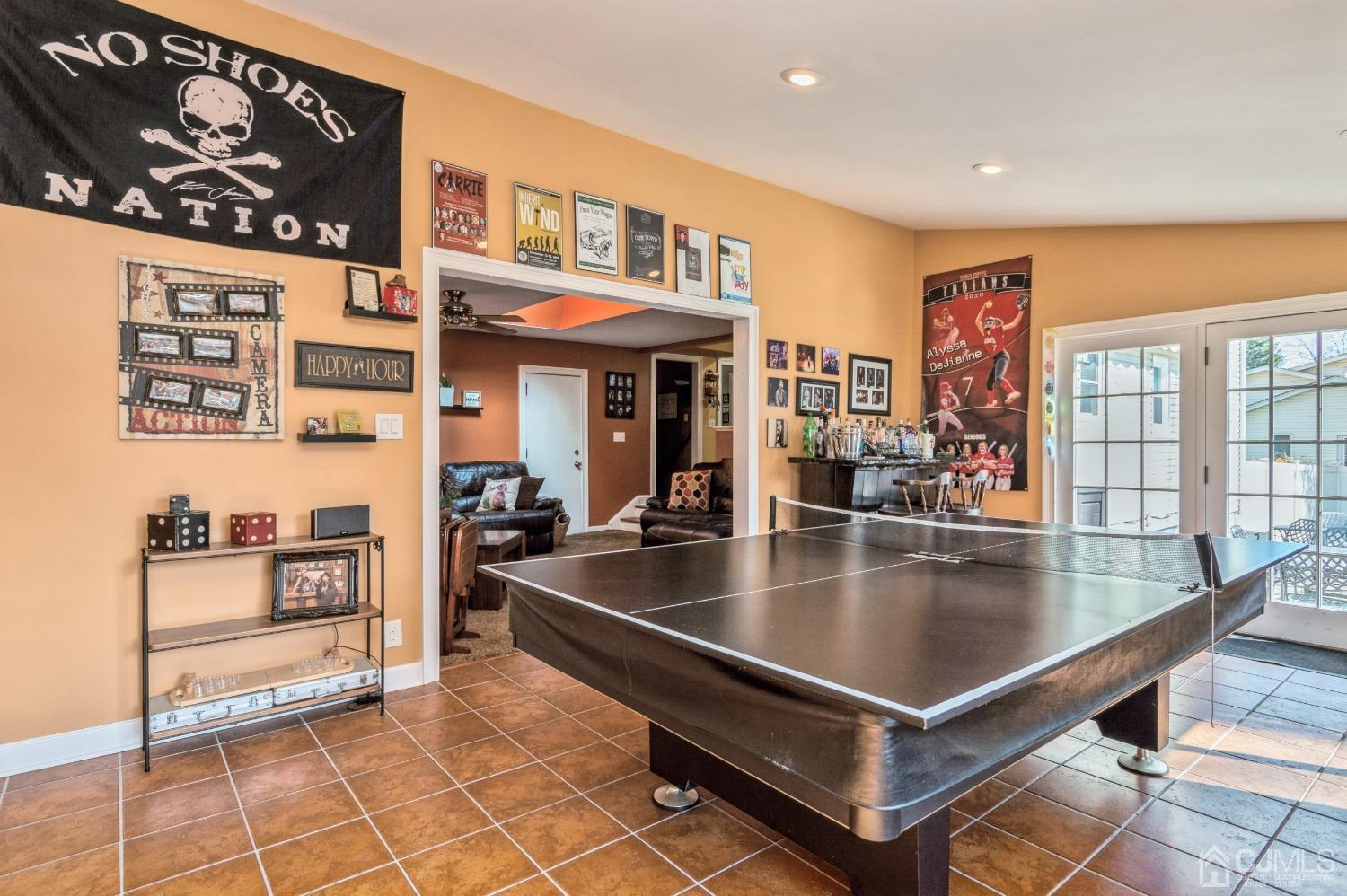 11 Boxwood Road Piscataway, NJ 08854 - Photo 15 of 28 a living room with stainless steel appliances lots of furniture and rug floor